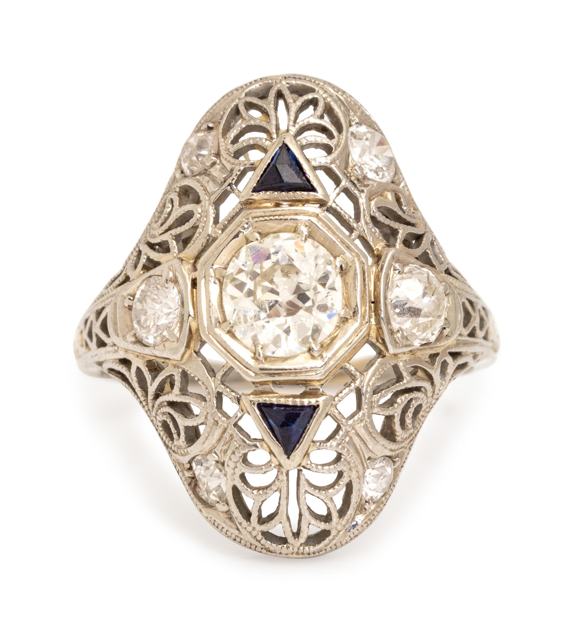 An Art Deco 18 Karat White Gold, Diamond and Synthetic Sapphire Ring,