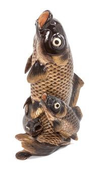 A Japanese Gilt Decorated Black Glazed Pottery Figural Group Height 11 1/2 inches.