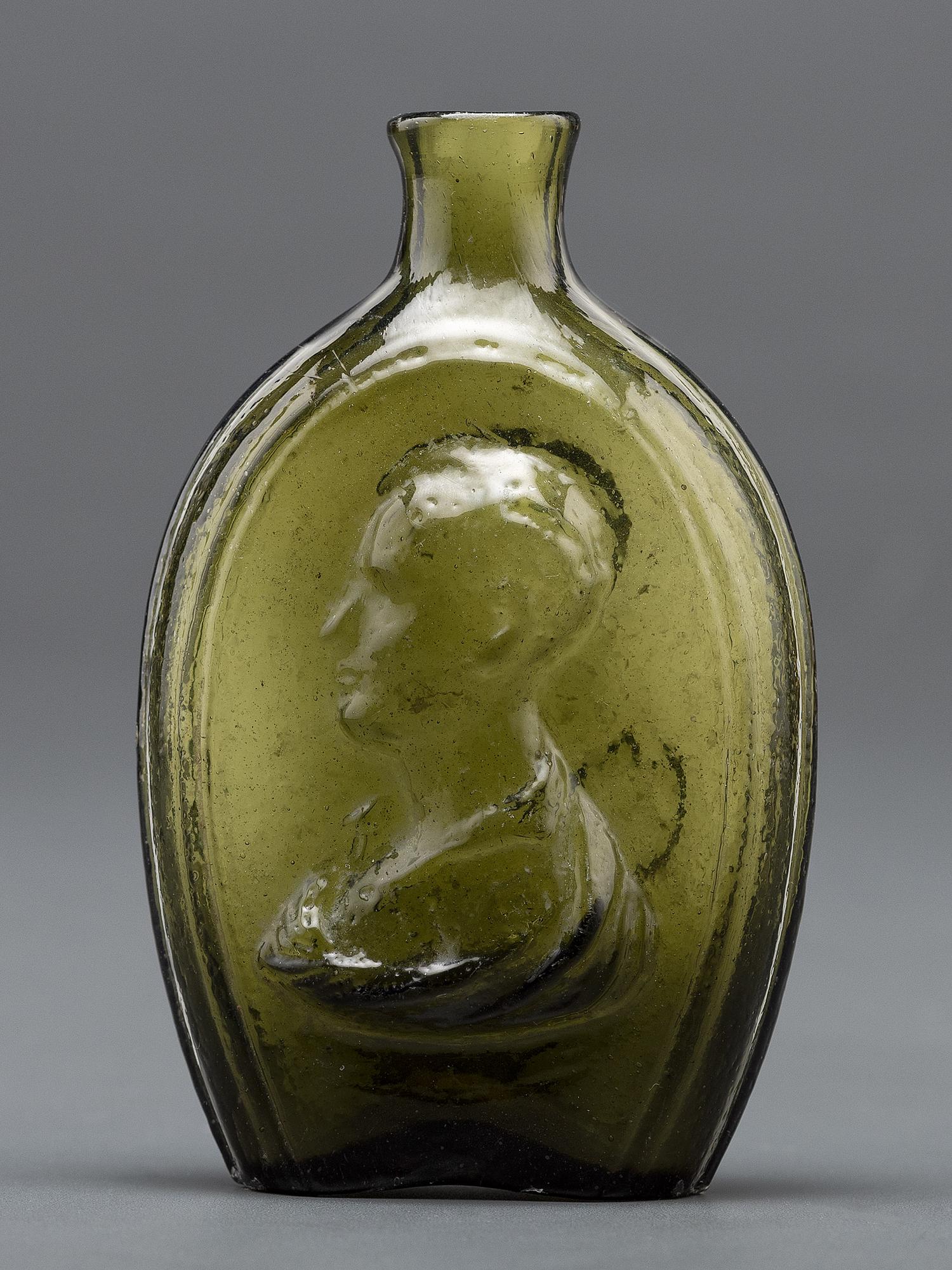 An Olive Green Glass Portrait Bust Flask