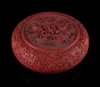 A Cinnabar Lacquer Circular Covered Box Diameter 15 1/8 inches.