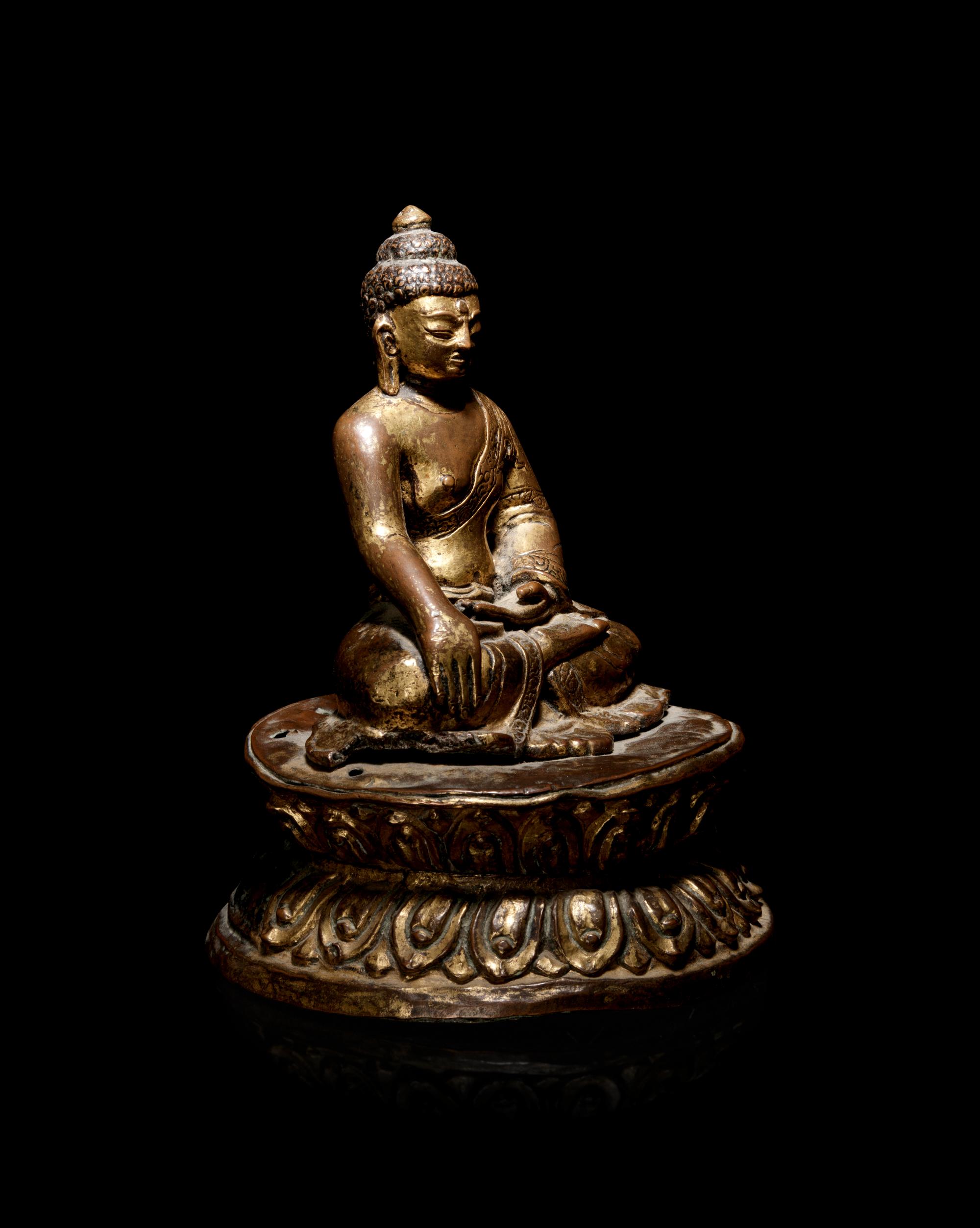 A Nepalese Gilt Bronze Figure of Buddha Shakyamuni