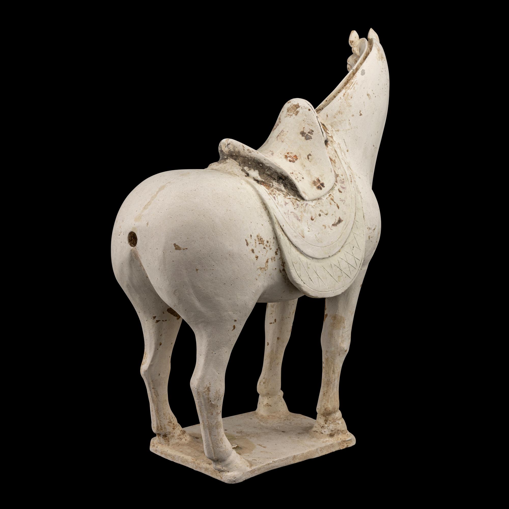A Chinese Painted Pottery Figure of a Horse