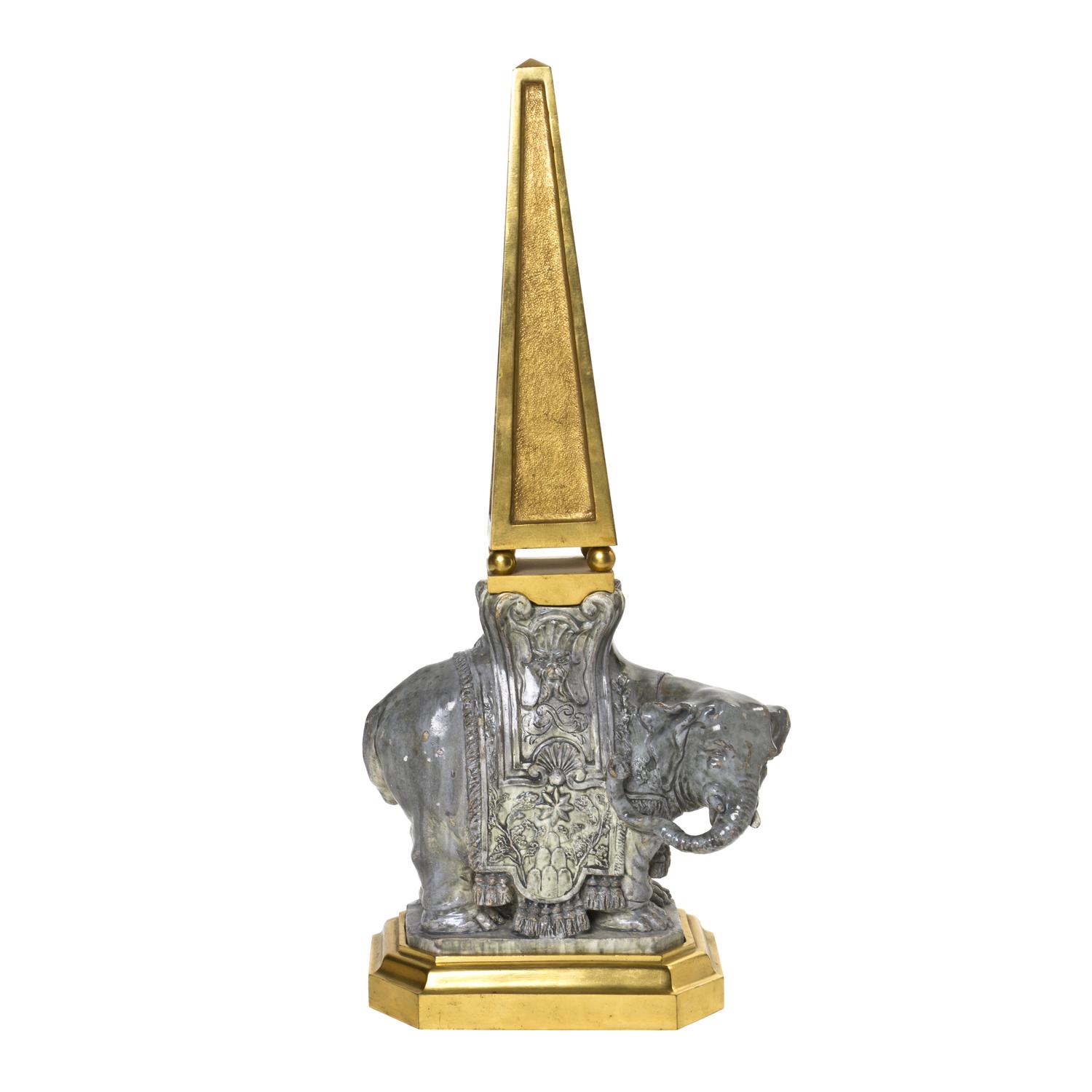 A Continental Gilt Bronze and Glazed Earthenware Elephant Obelisk