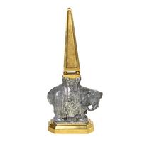 A Continental Gilt Bronze and Glazed Earthenware Elephant Obelisk