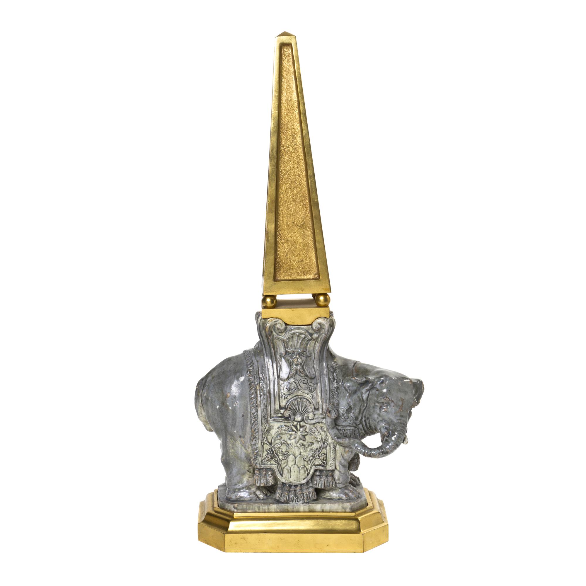 A Continental Gilt Bronze and Glazed Earthenware Elephant Obelisk