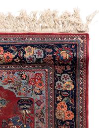 A Kashan Wool and Silk Rug