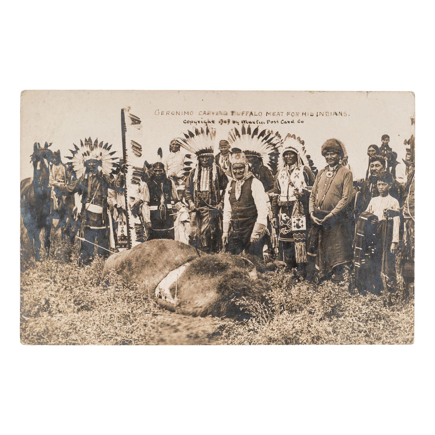 [NATIVE AMERICANS]. Geronimo Carving Buffalo Meat for His Indians. Kansas City, Missouri: Martin Post Card Co., [ca 1907-1911].