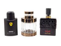 A Group of Three Factice Perfume Bottles