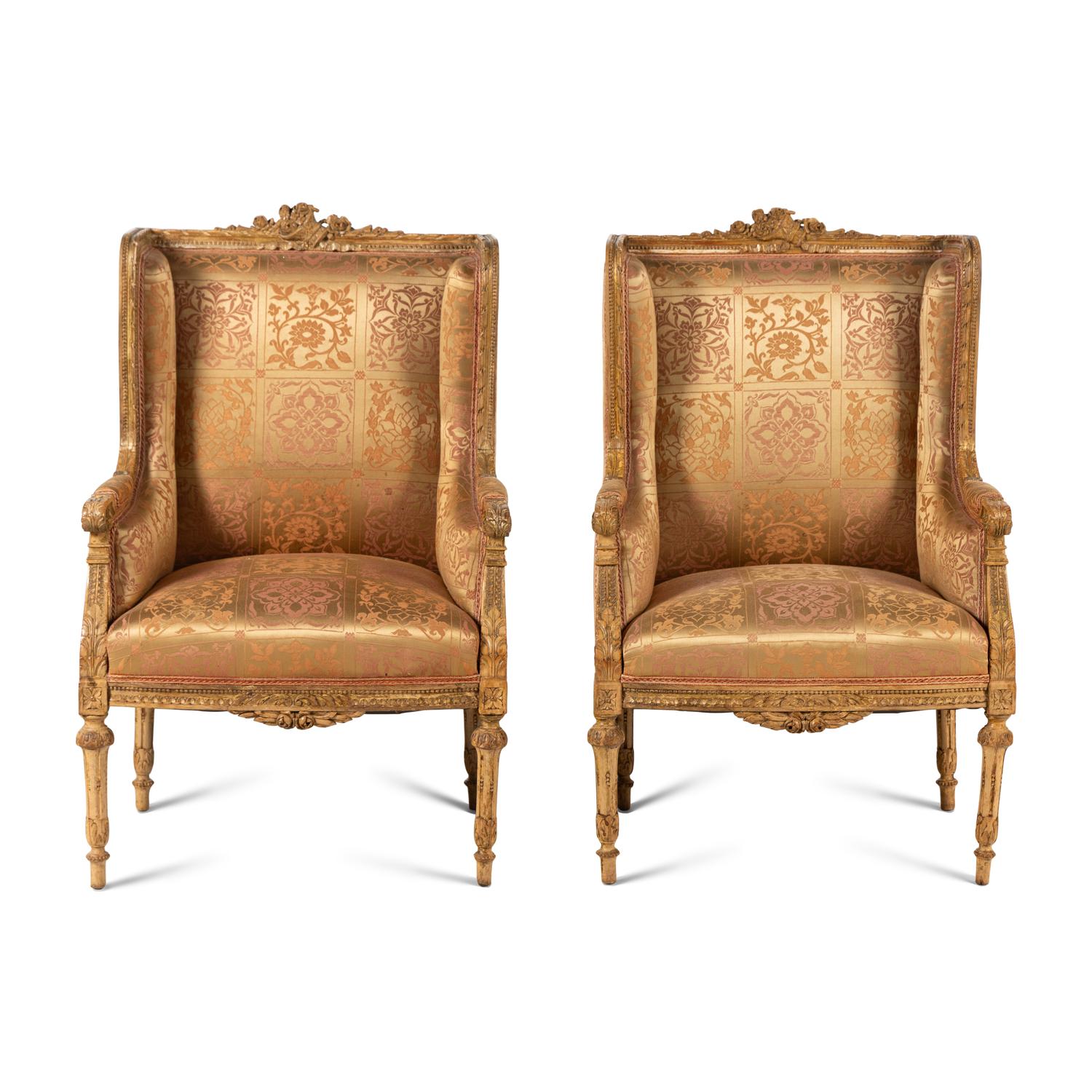 A Pair of Louis XVI Carved Giltwood Bergères