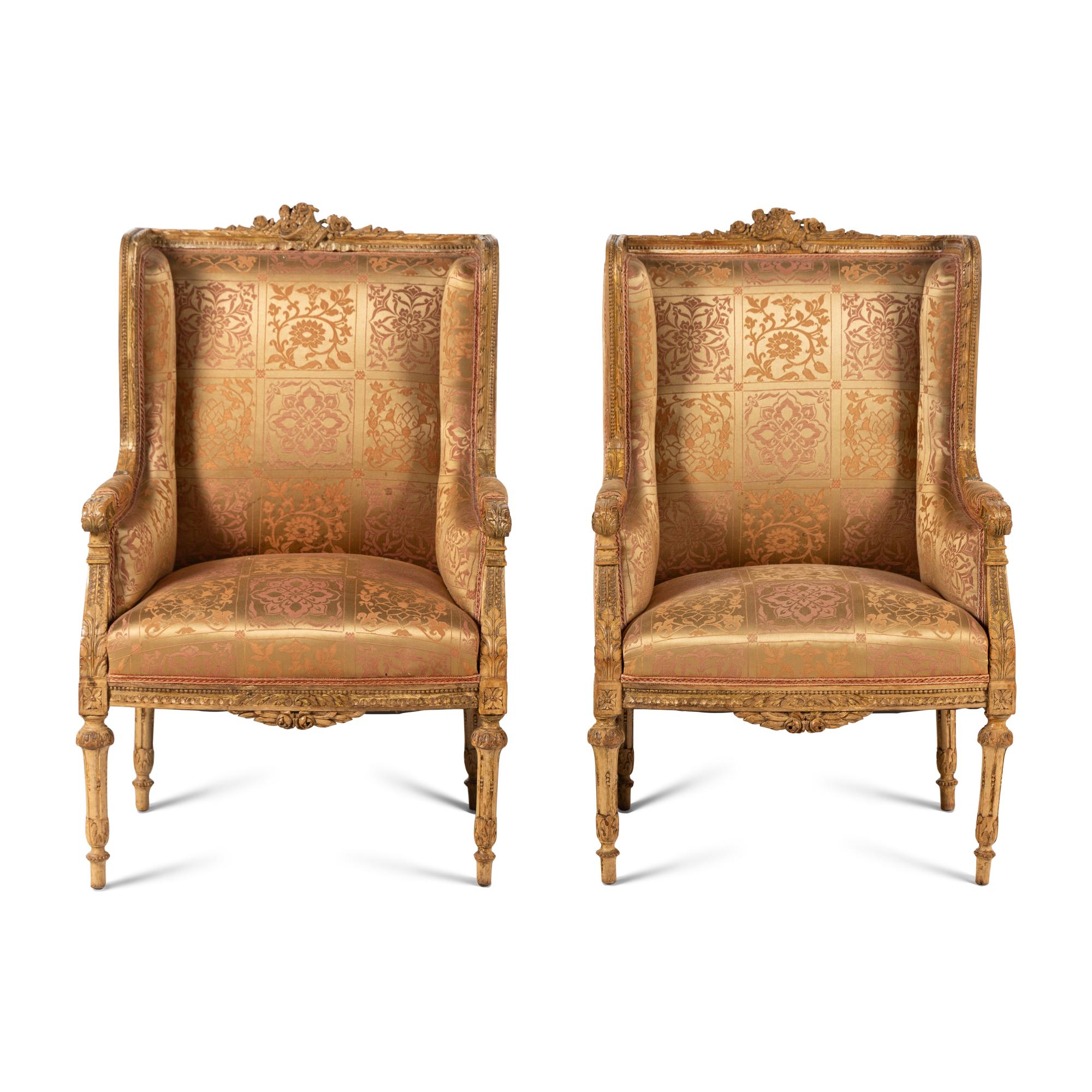 A Pair of Louis XVI Carved Giltwood Bergères
