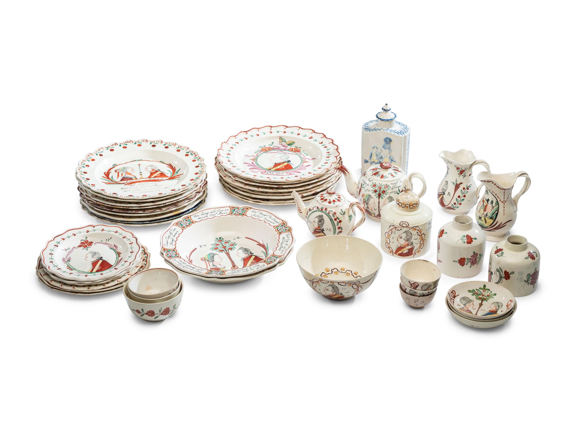 An Assembled Collection of English Creamware 'William of Orange' Table Articles