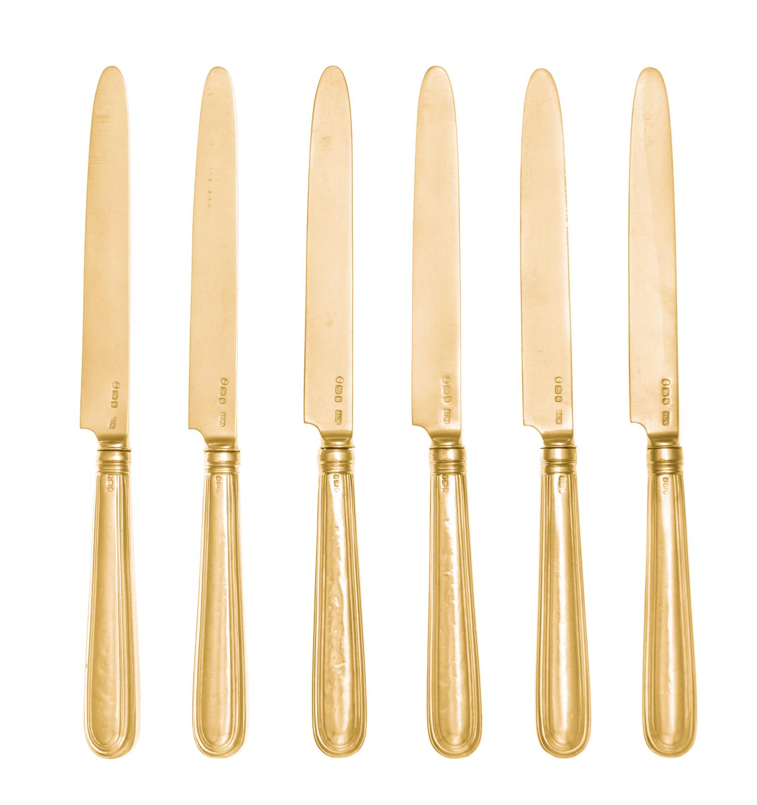 A Set of Twelve George III Silver-Gilt Dessert Knives, William Abdy, London, 1793, each having thread decorated handles bearing an engr