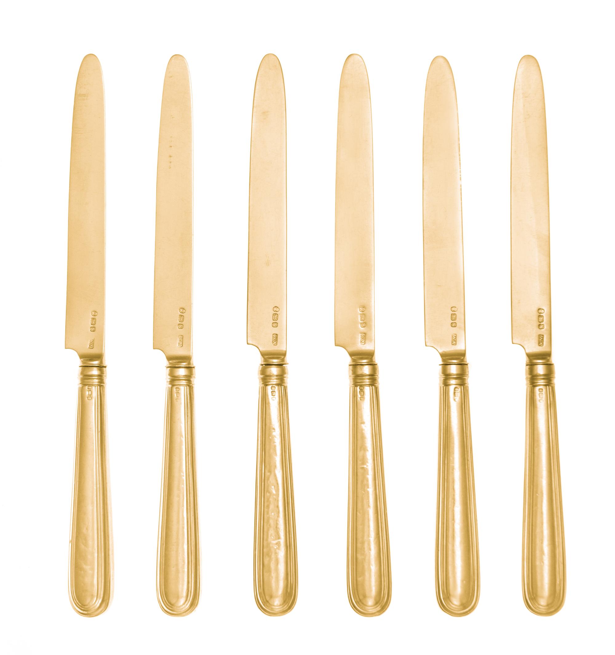 A Set of Twelve George III Silver-Gilt Dessert Knives, William Abdy, London, 1793, each having thread decorated handles bearing an engr