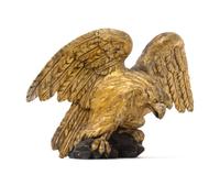 A Carved Giltwood Eagle Applique Height 14 x width 22 inches. — 19TH CENTURY