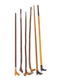 A Group of Folk Art Carved Shoe-Form Canes