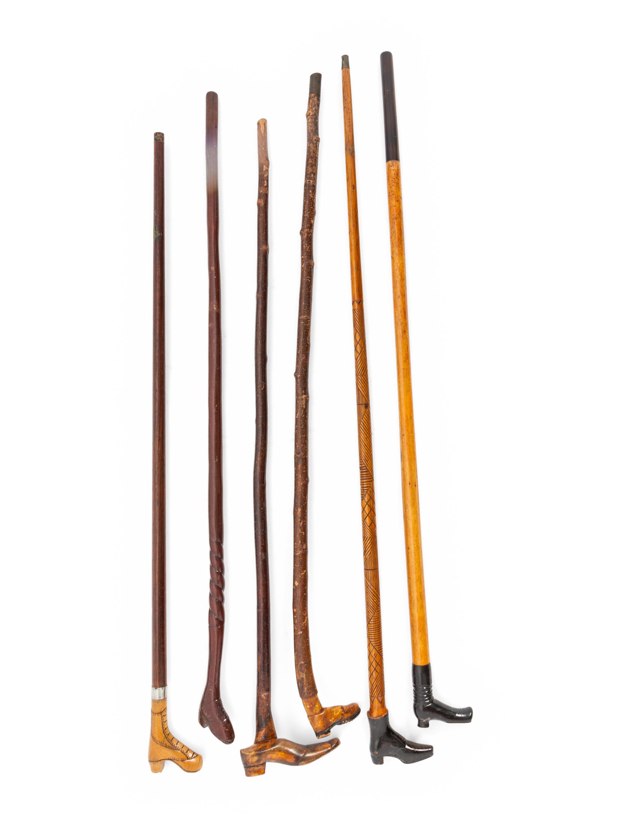 A Group of Folk Art Carved Shoe-Form Canes