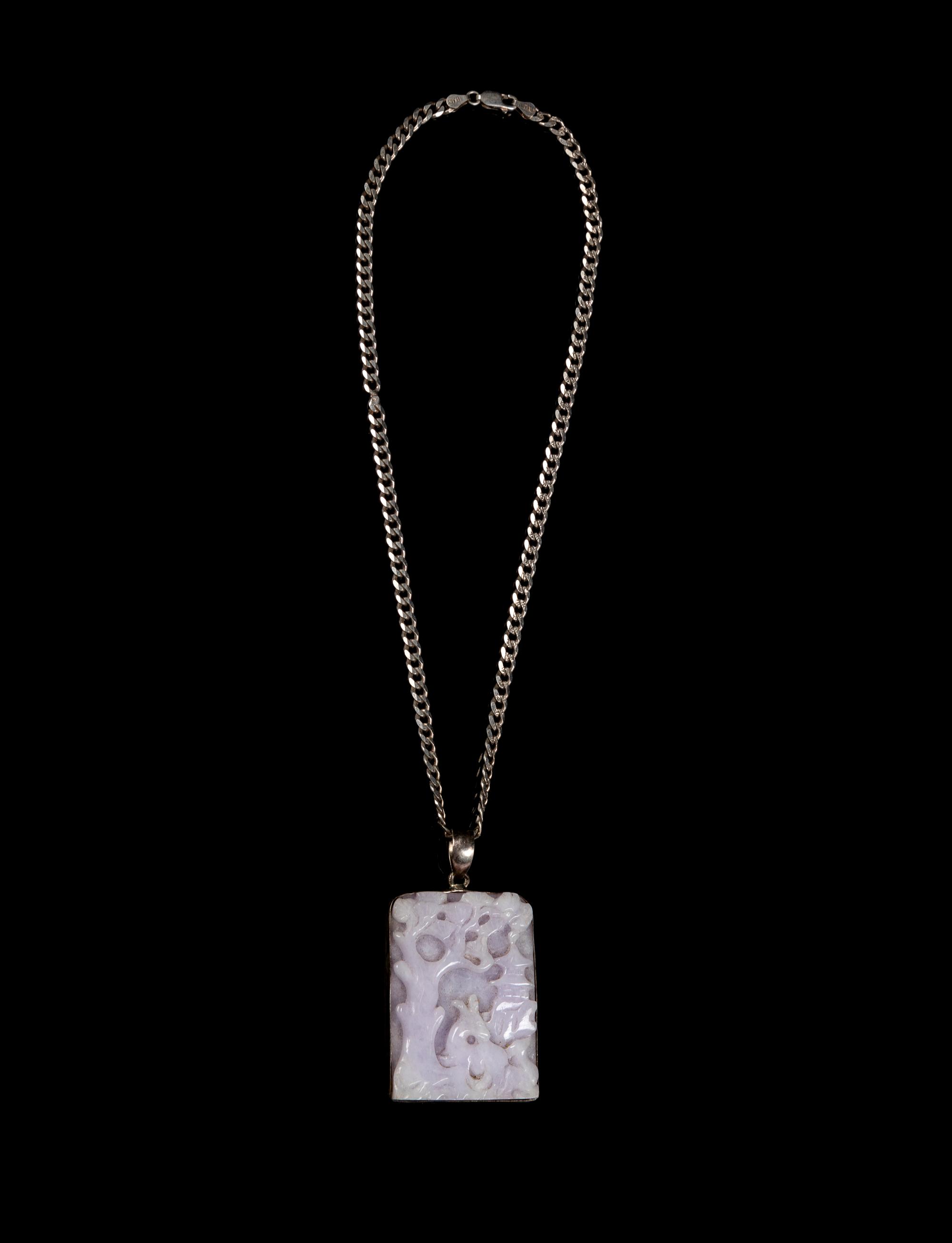 A Chinese Lavender Jadeite and Silver Necklace