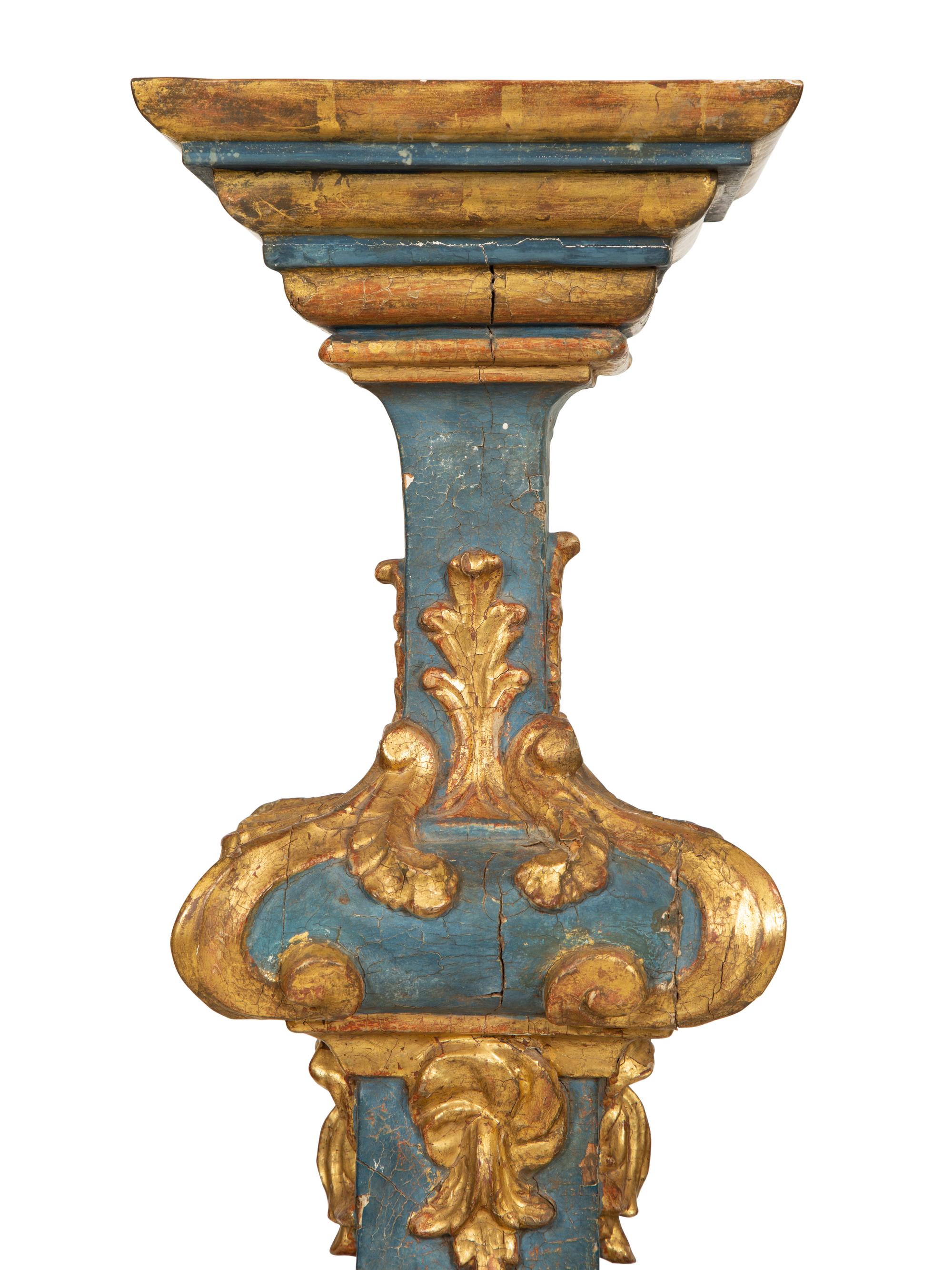 A Pair of Italian Baroque Blue-Painted and Parcel-Gilt Pedestals