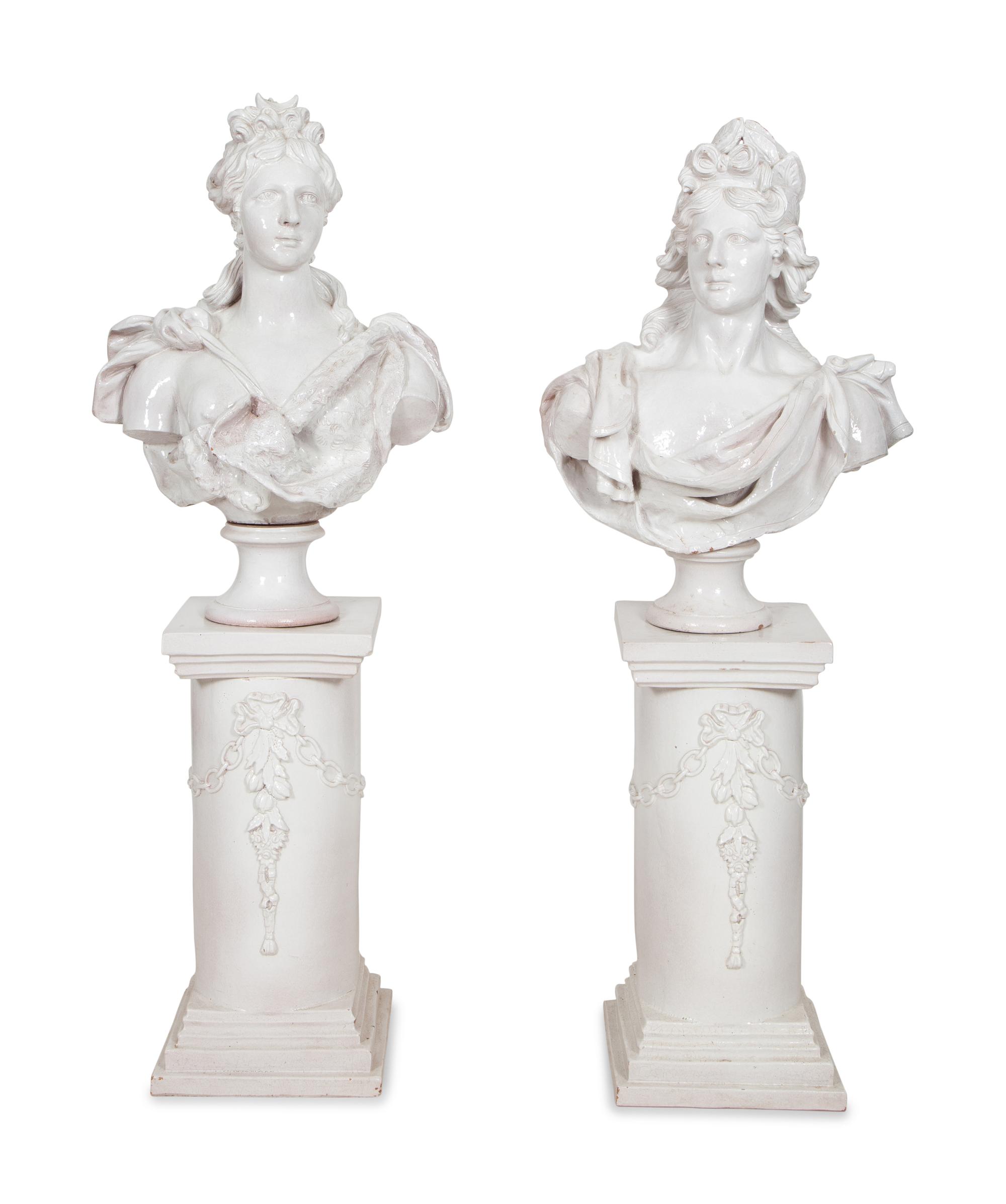 A Pair of Italian Glazed Terracotta Portrait Busts on Neoclassical Style Pedestals