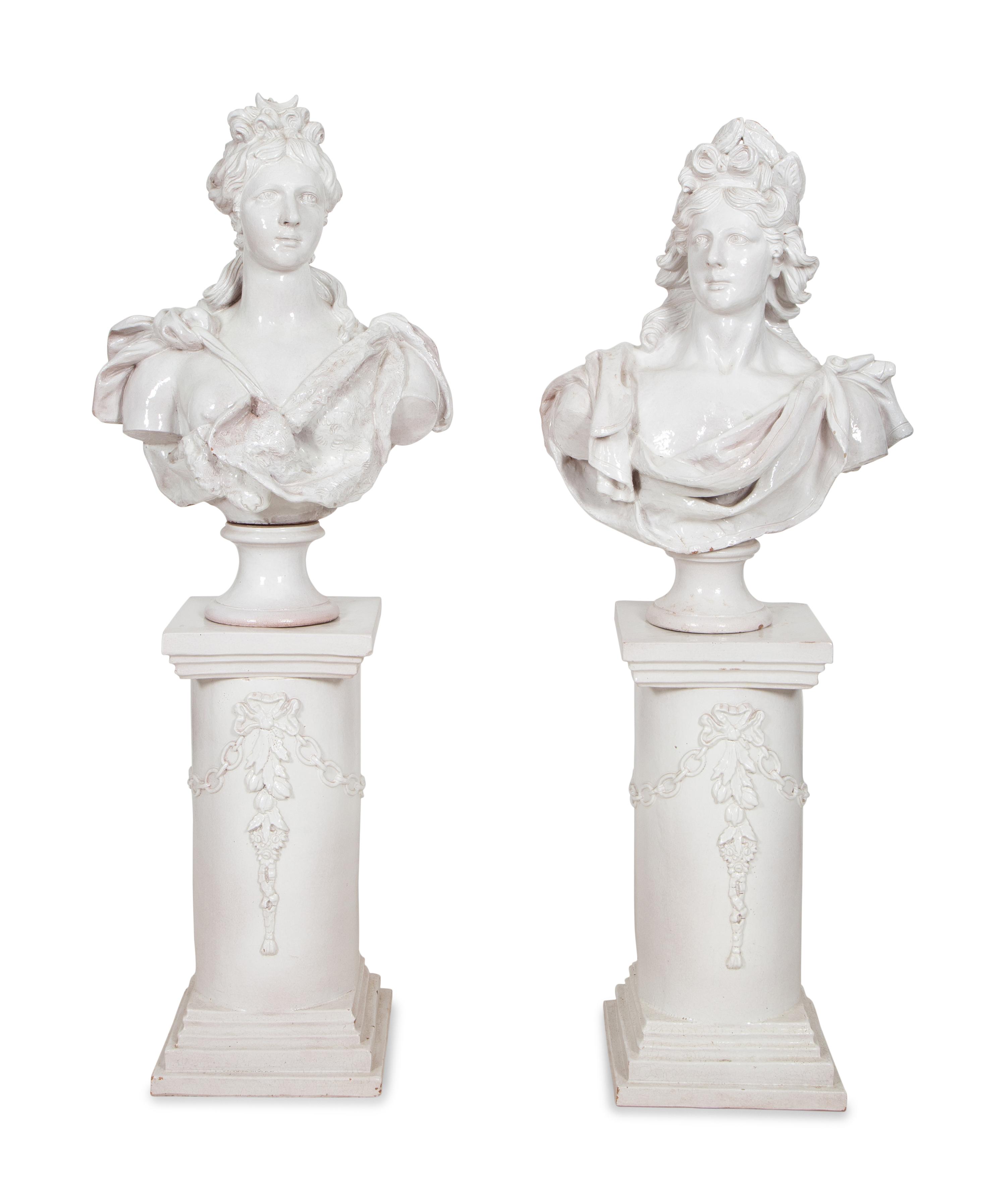 A Pair of Italian Glazed Terracotta Portrait Busts on Neoclassical Style Pedestals