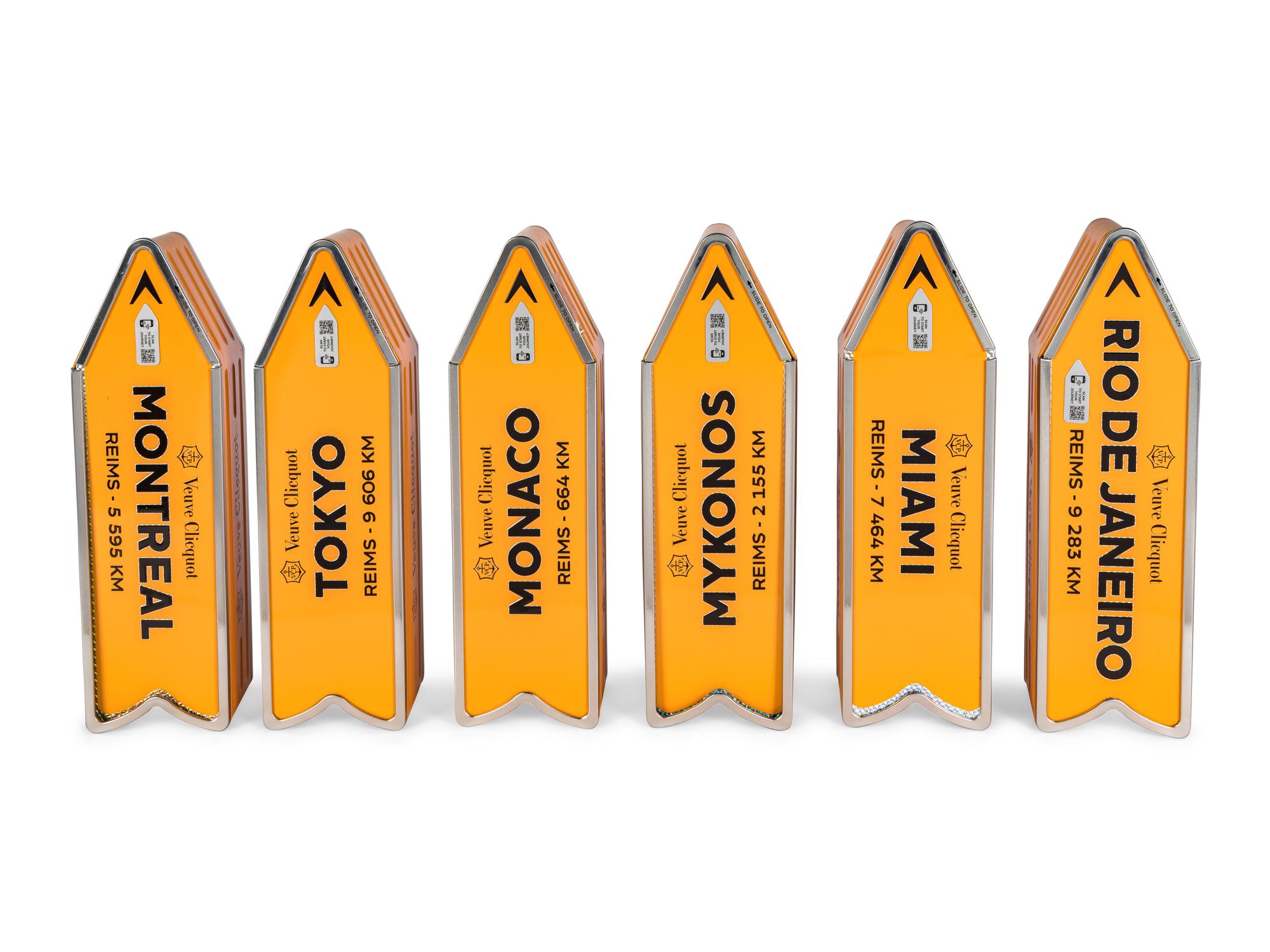 A Set of Six Veuve Clicquot "Arrow" Gift Tins