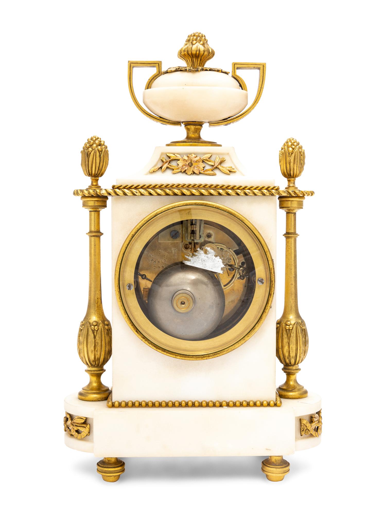 A French Gilt Bronze and Marble Clock