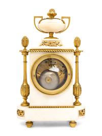 A French Gilt Bronze and Marble Clock