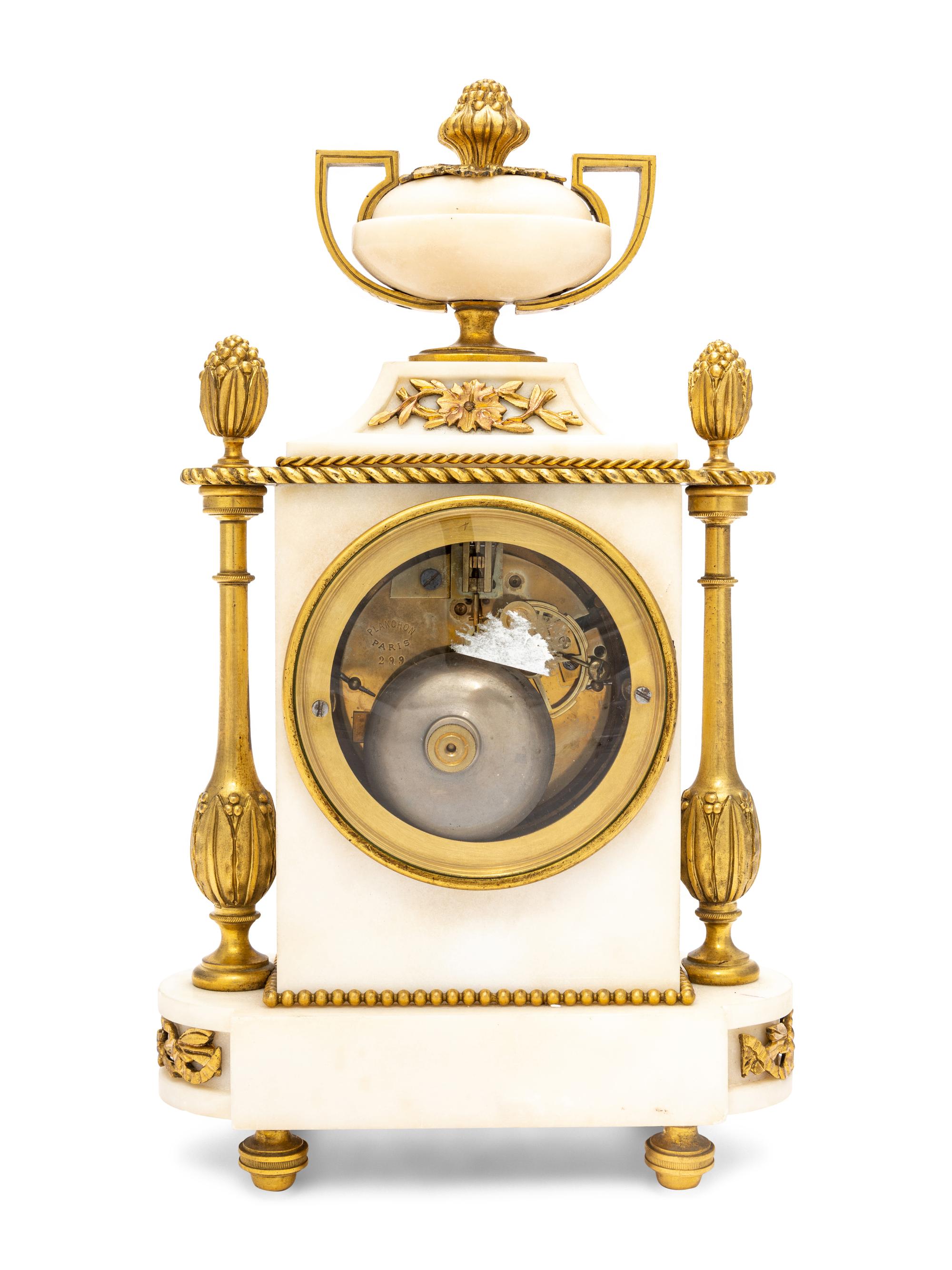 A French Gilt Bronze and Marble Clock