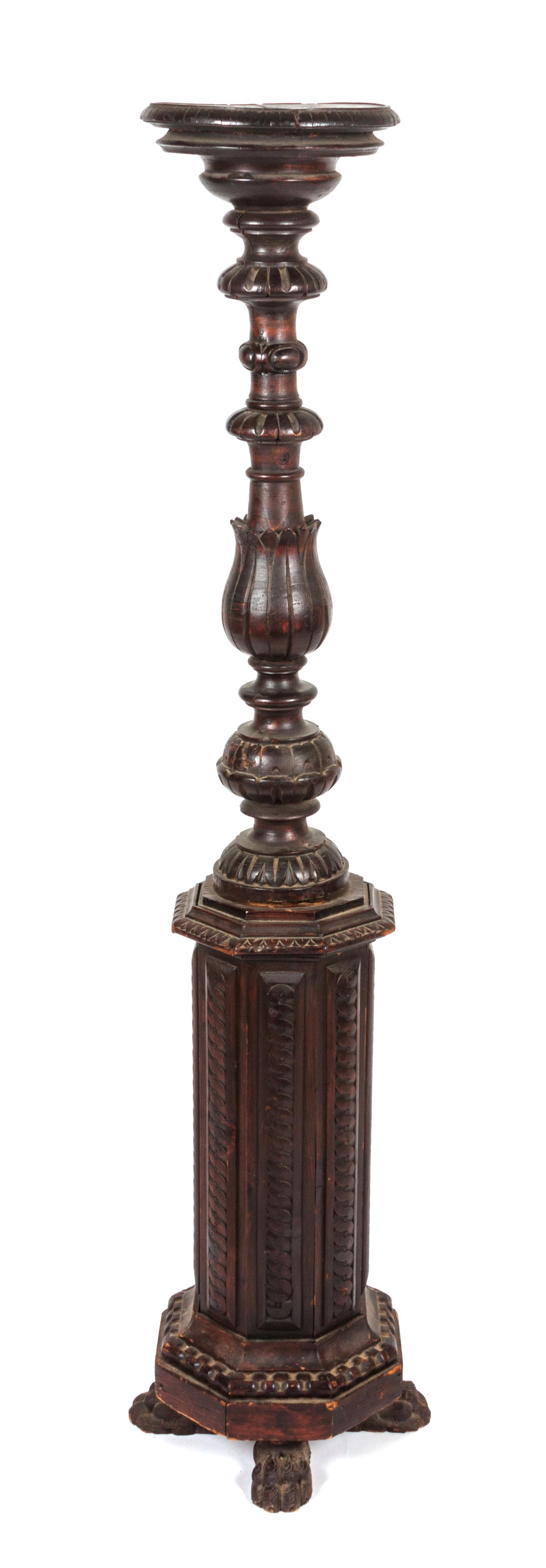 A Carved Walnut Pedestal Height 54 inches.