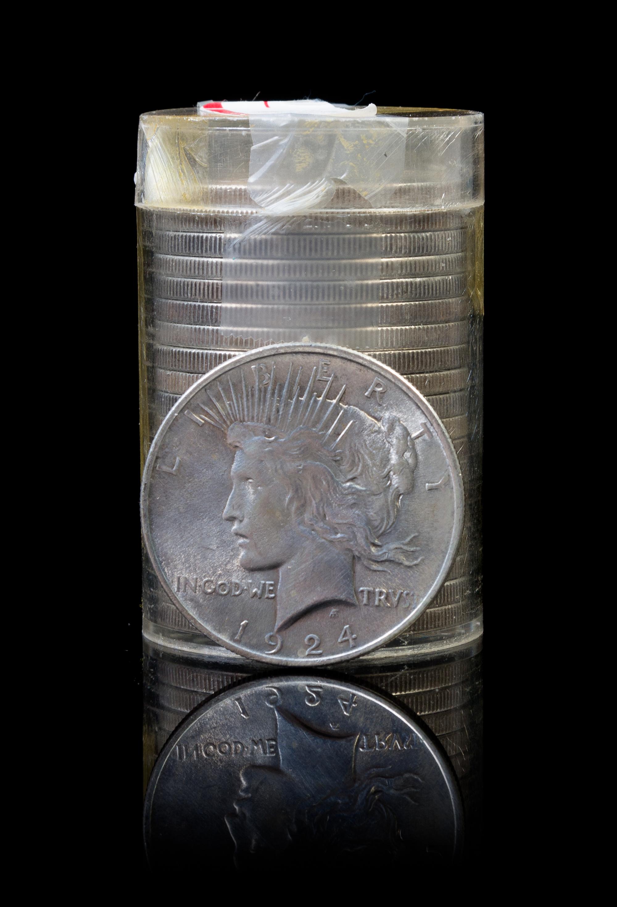 A Group of Twenty United States 1924 Peace Silver Dollars