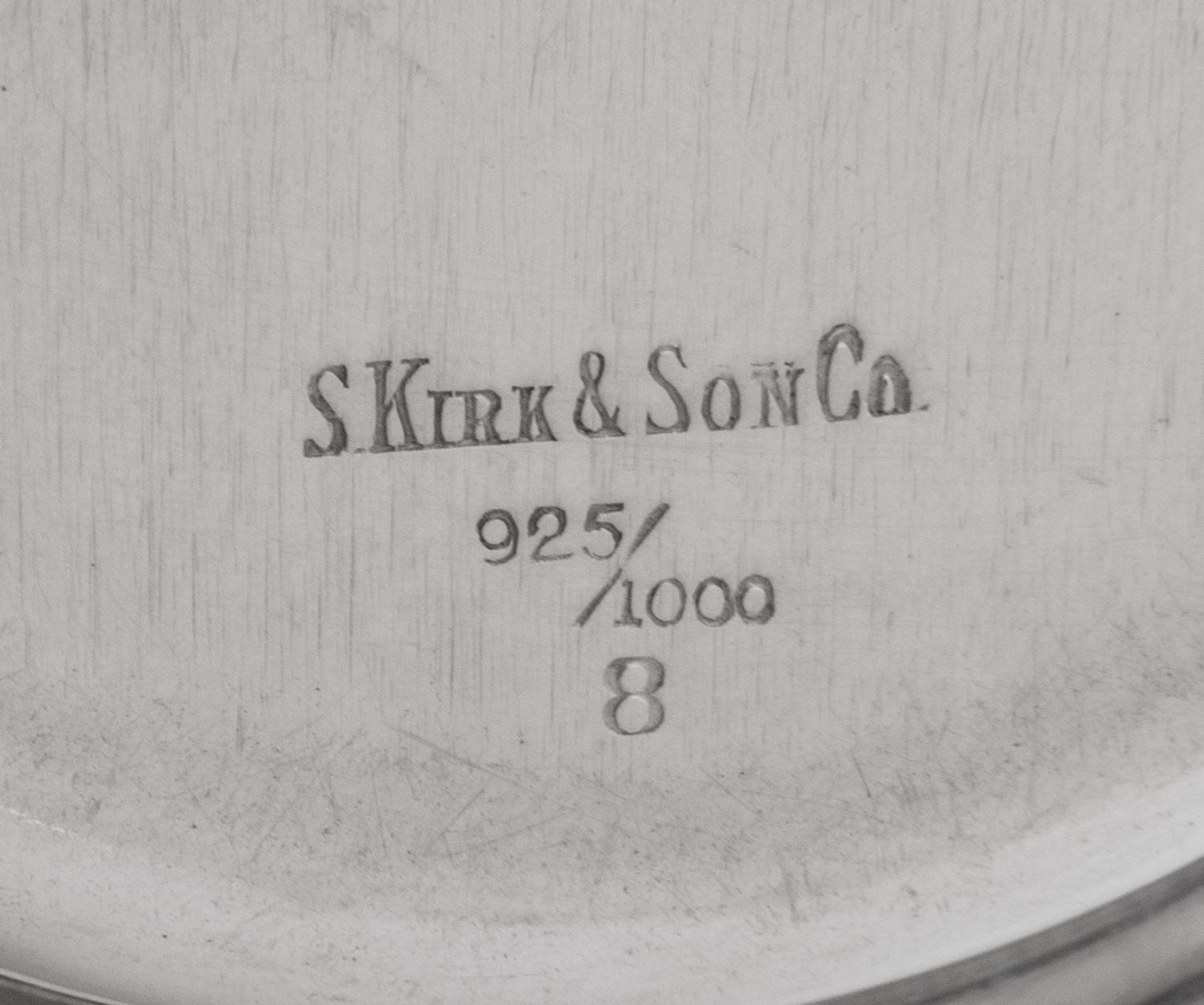 A Set of Four S. Kirk and Son Silver Butter Pats