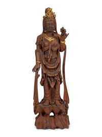 A Carved and Gilt Guanyin Statue