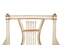 A Continental Painted and Parcel Gilt Fauteuil