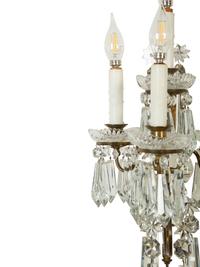 A Pair of Continental Gilt Metal and Cut Glass Four-Light Sconces