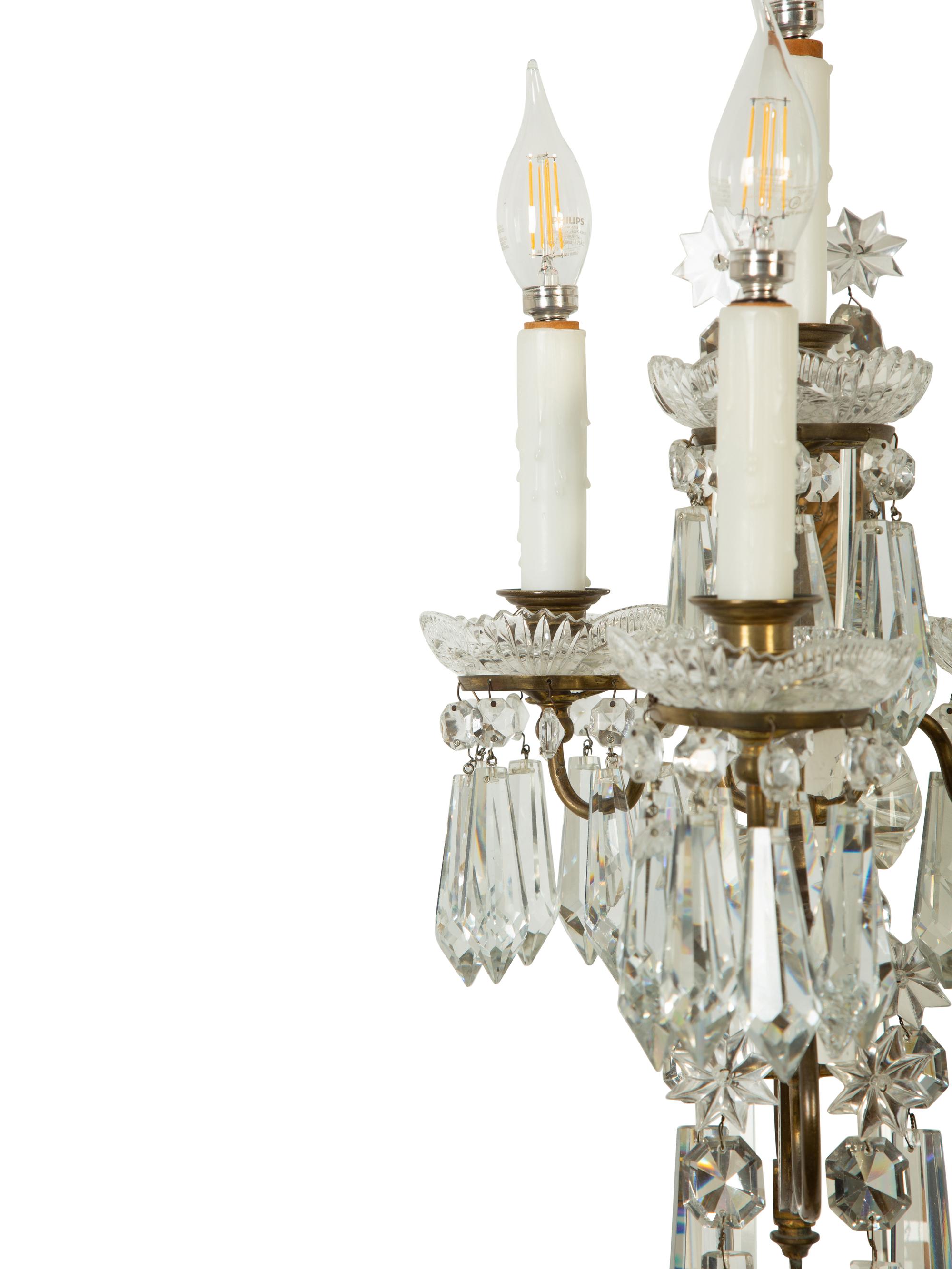 A Pair of Continental Gilt Metal and Cut Glass Four-Light Sconces
