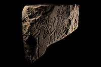 An Egyptian Limestone Relief Fragment
