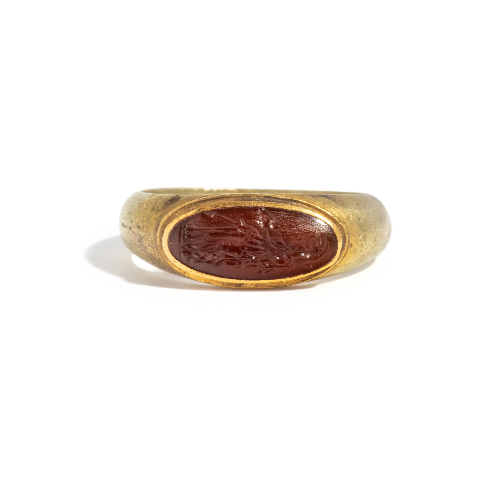 A Roman Gold and Carnelian Finger Ring with the Goddess Minerva