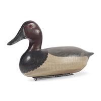 A Carved and Painted Wood Combed Canvasback Duck Decoy