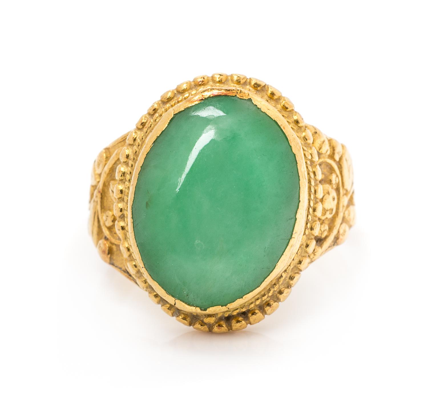 A 24 Karat Yellow Gold and Jade Ring, 7.70 dwts.