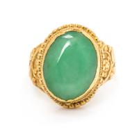 A 24 Karat Yellow Gold and Jade Ring, 7.70 dwts.
