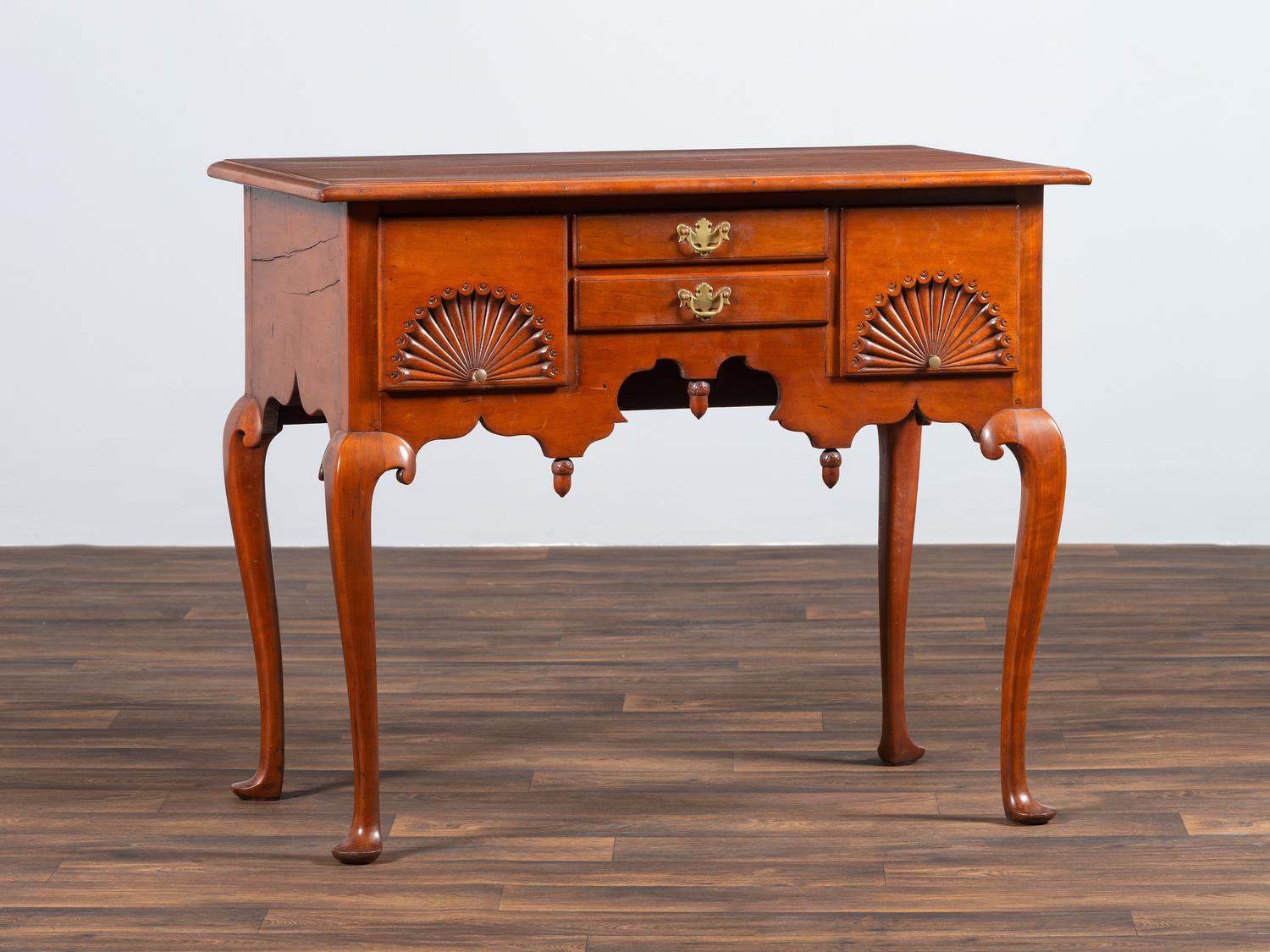 A Queen Anne Fan Carved Cherrywood Dressing Table