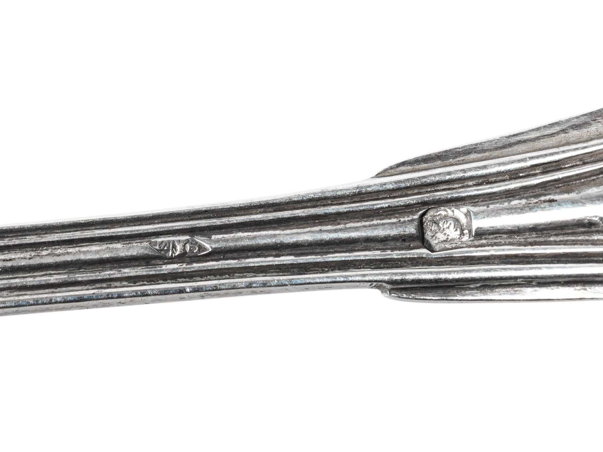 A Set of Twelve Silver Spoons