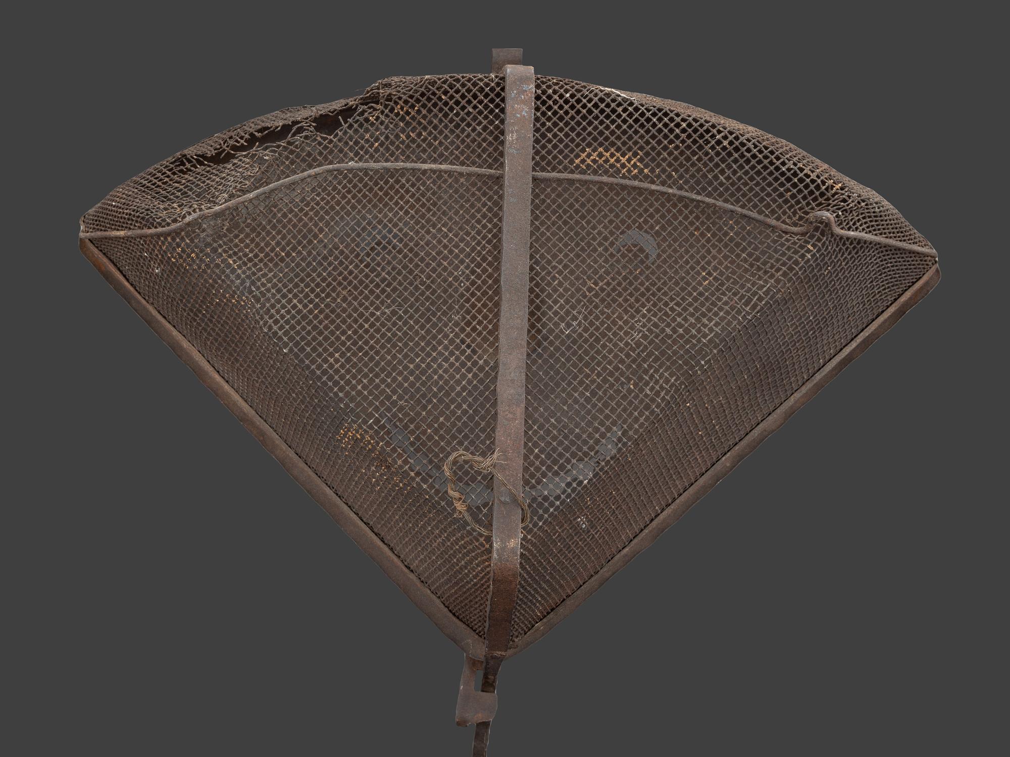A Forged and Hammered Iron Figural Chestnut Roaster