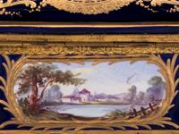 A Sèvres Style Gilt Metal Mounted, Painted and Parcel Gilt Porcelain Table Casket