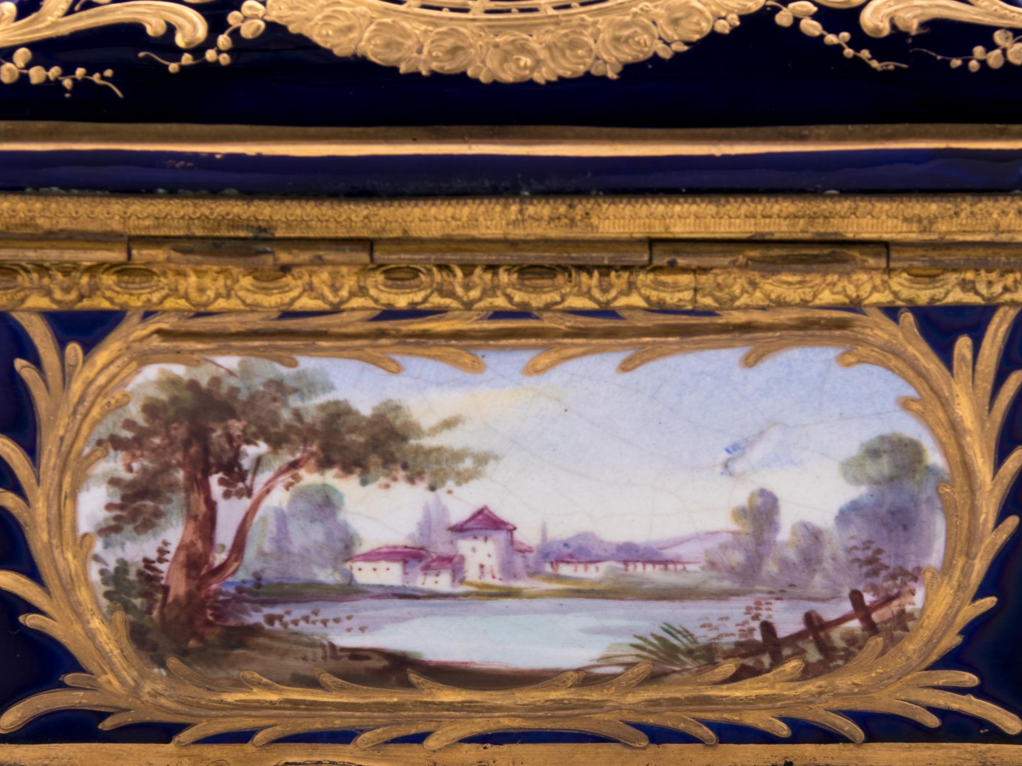 A Sèvres Style Gilt Metal Mounted, Painted and Parcel Gilt Porcelain Table Casket