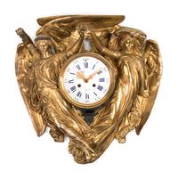 A Neoclassical Gilt Bronze Wall Clock by Louis Valentin Elias Robert (French, 1821-1874)
