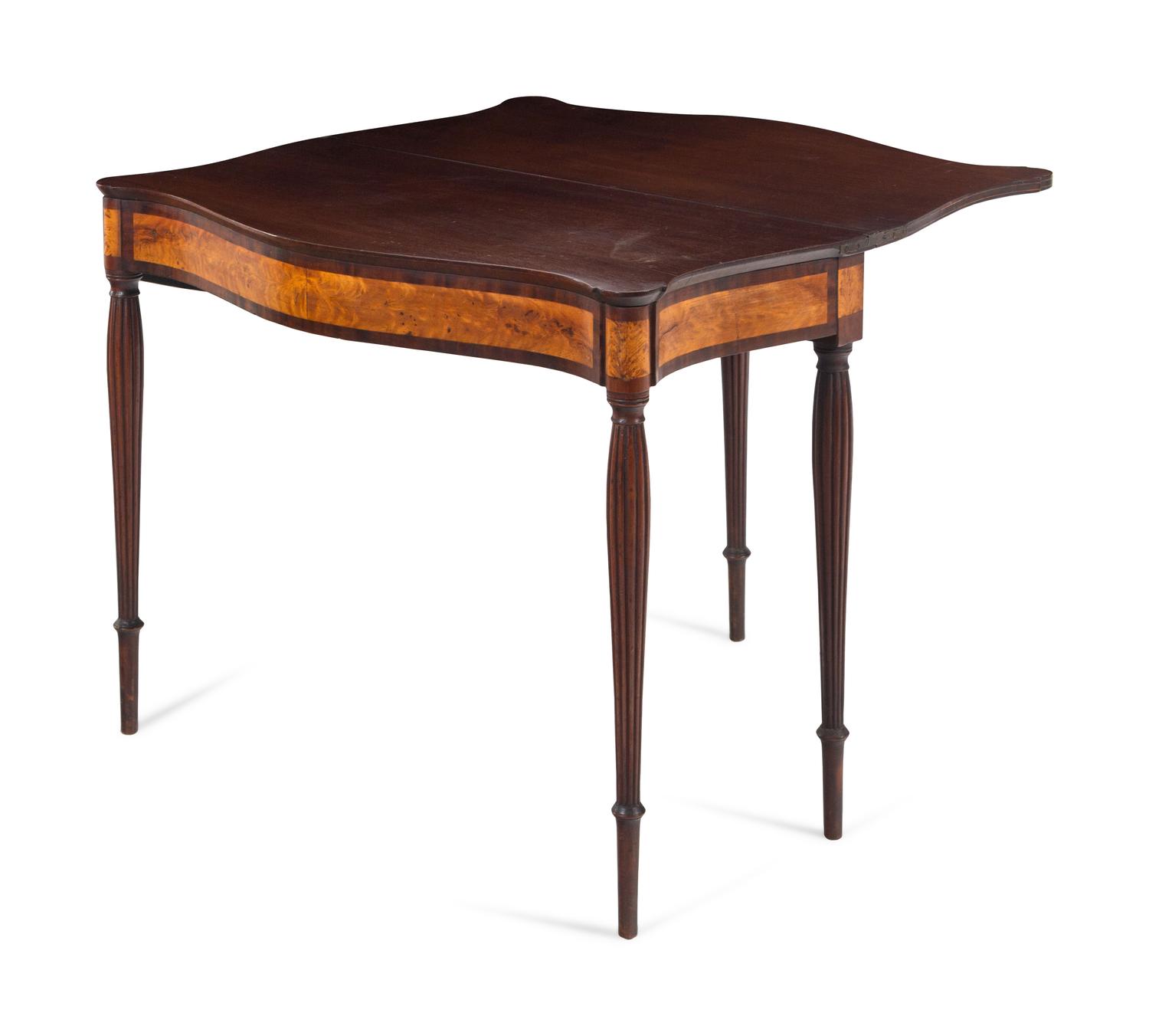 A Federal Birch and Mahogany Serpentine-Top Game Table