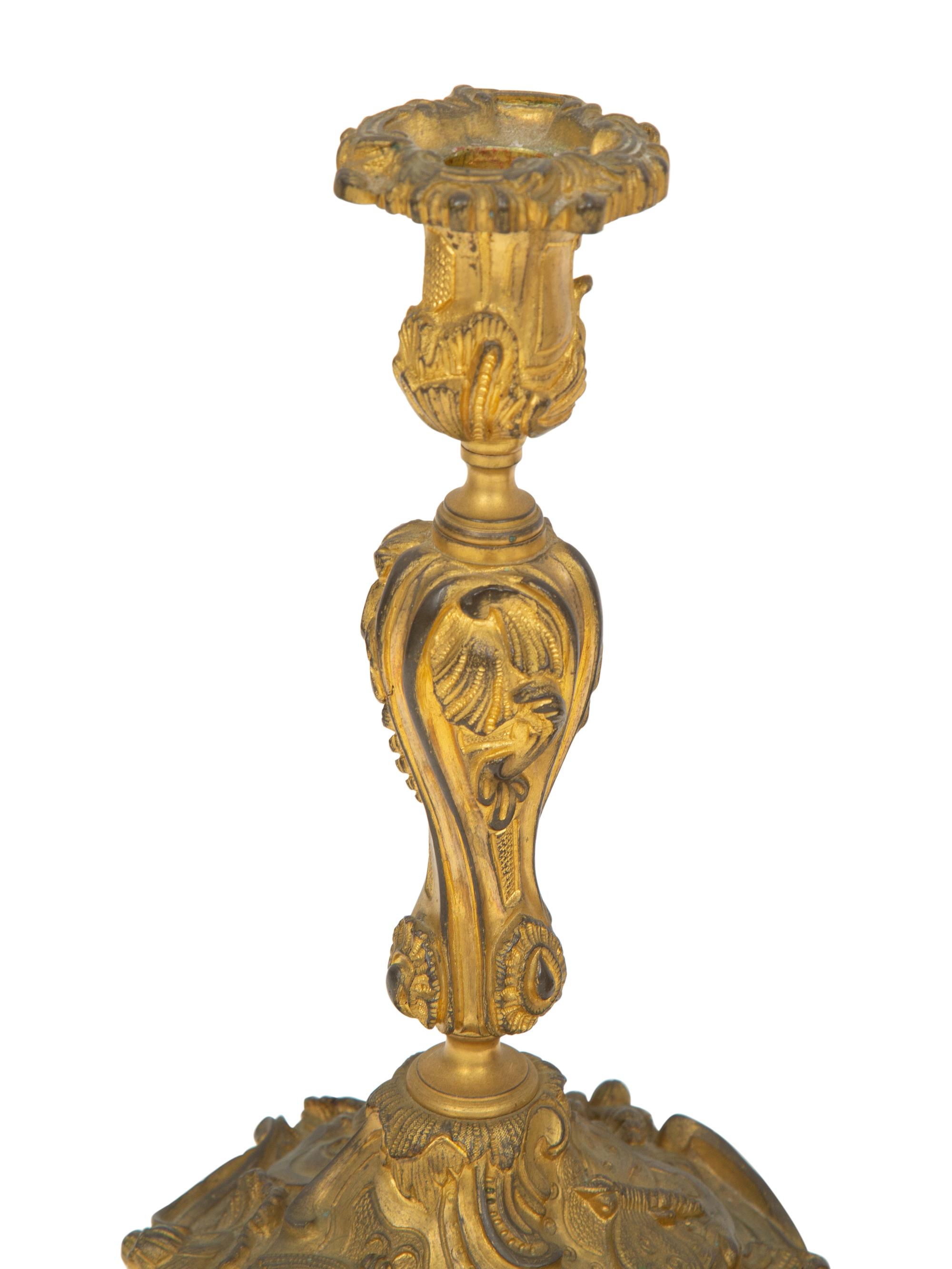 Two Pairs of Louis XV Style Gilt Bronze Candlesticks