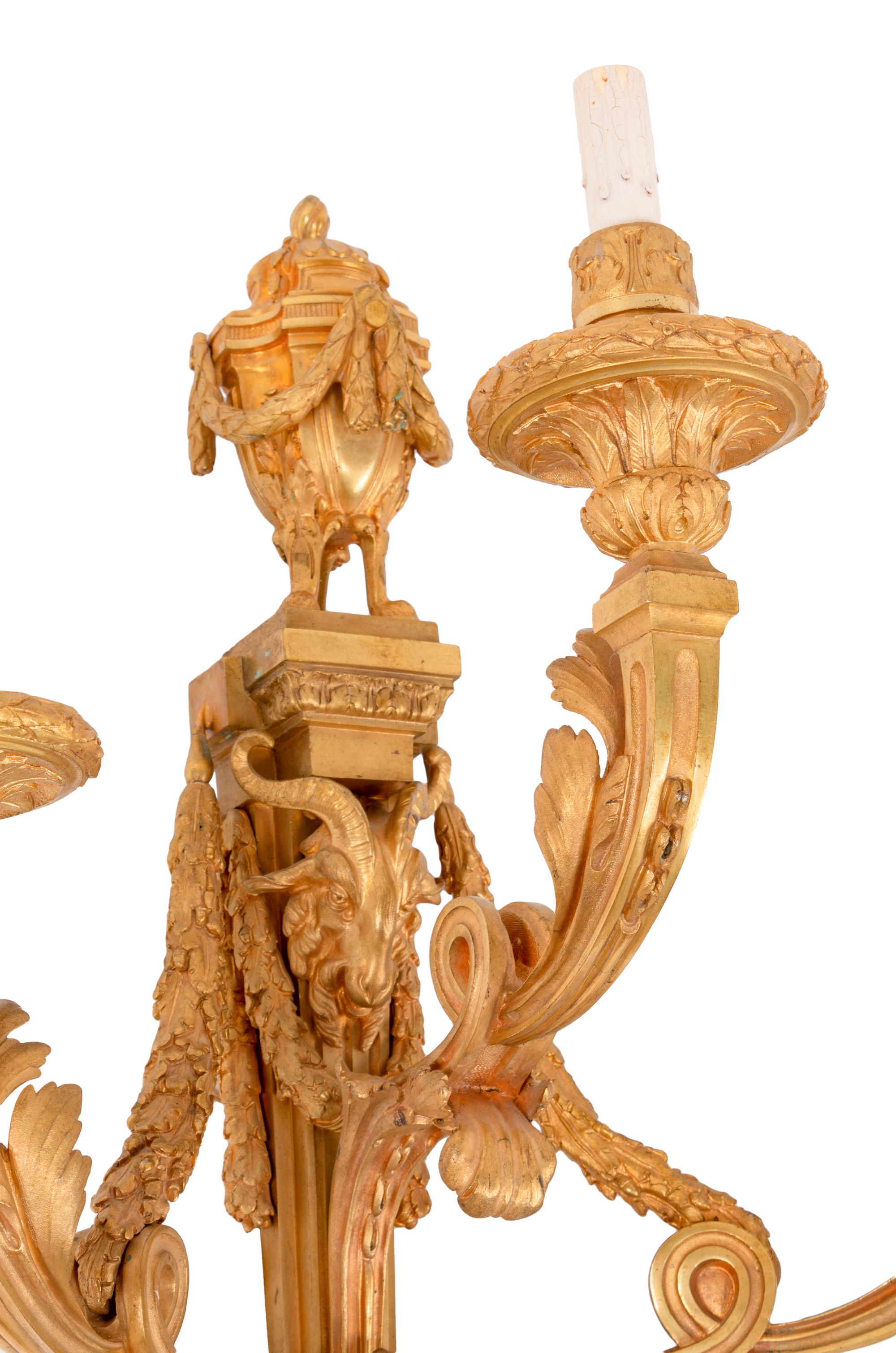A Pair of Louis XV Style Gilt Bronze Three-Light Sconces