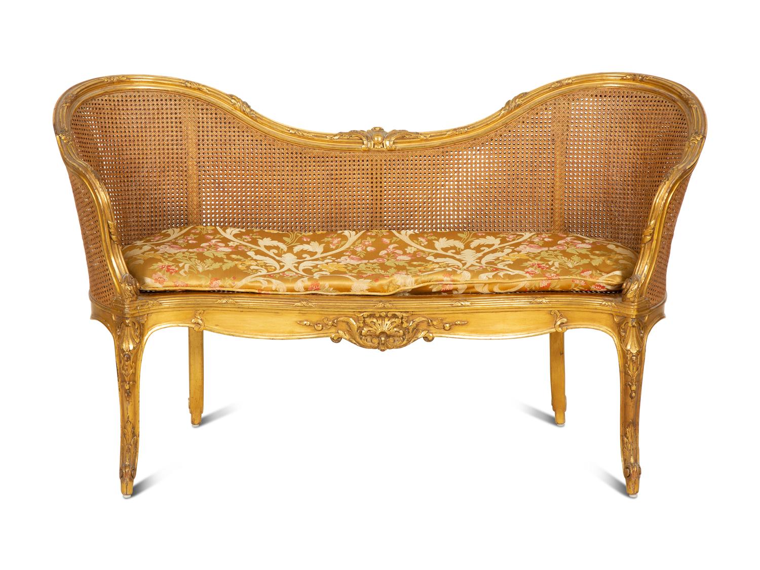 A Louis XV Style Caned Giltwood Settee